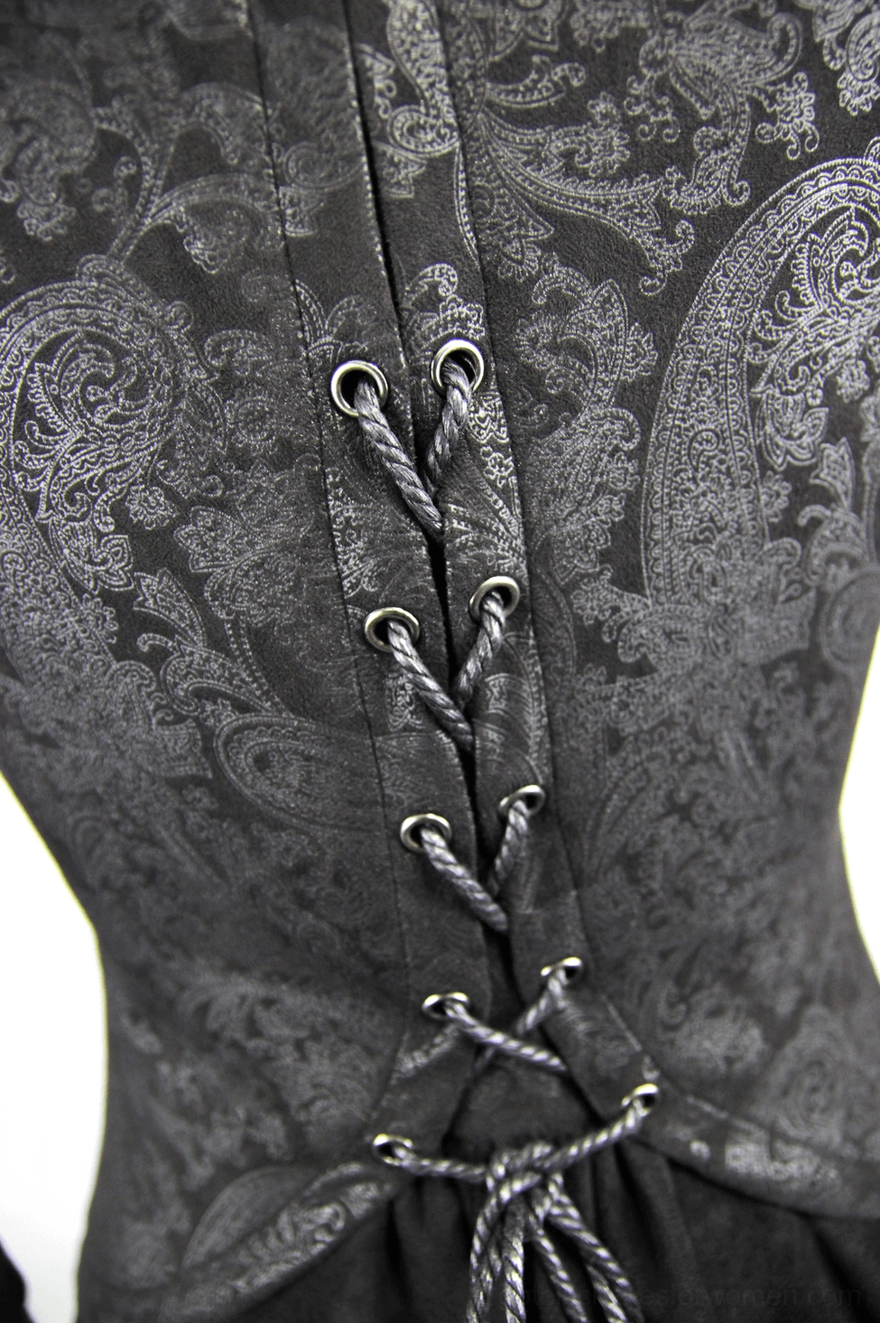Black gothic embossed coat full-length layering view showing dramatic silhouette, floor-length hem, and high collar presence