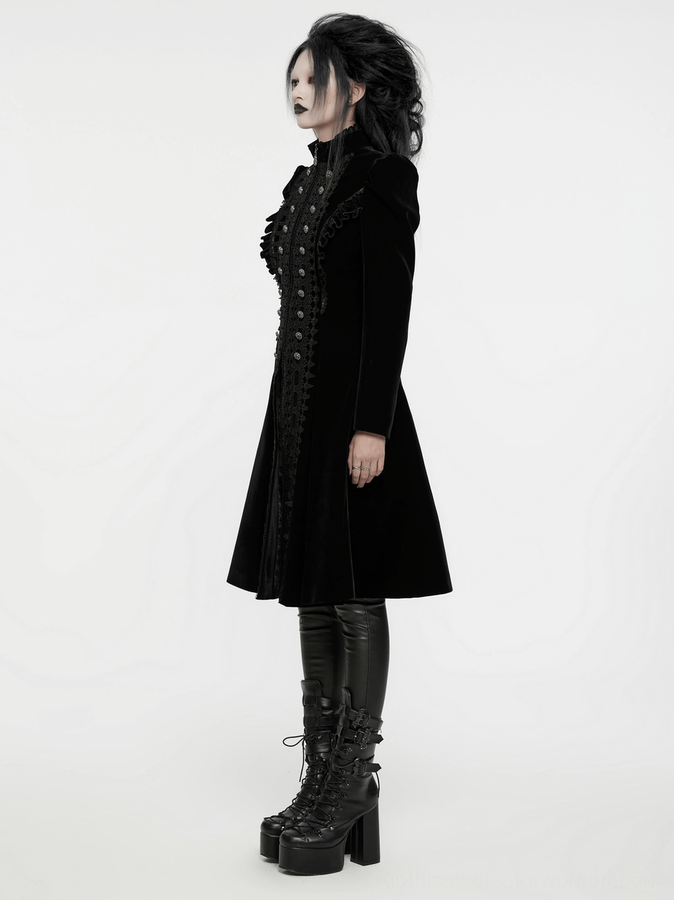 Black velvet gothic coat hem and ruffle accent detail, layered textile construction, finished edge details