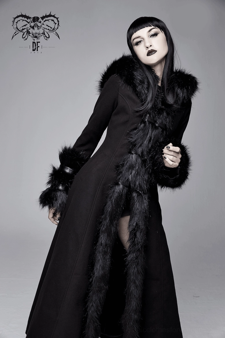 Additional angle of gothic black long coat displaying faux fur hood, front fur panel, leather cuff details, and overall dramatic silhouette