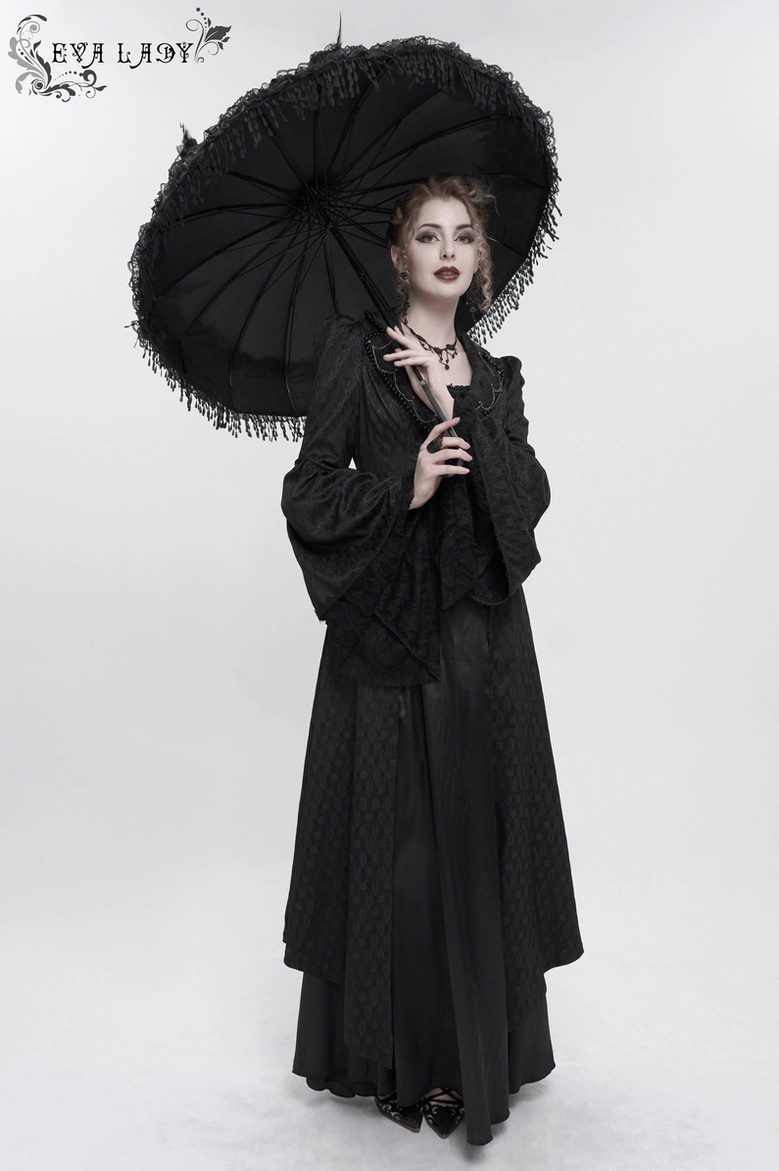 Black gothic coat showing overall proportions and tailored fit on form