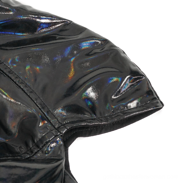 Holographic patent leather shoulder cutout close-up, showing iridescent shine and open seam design of gothic coat