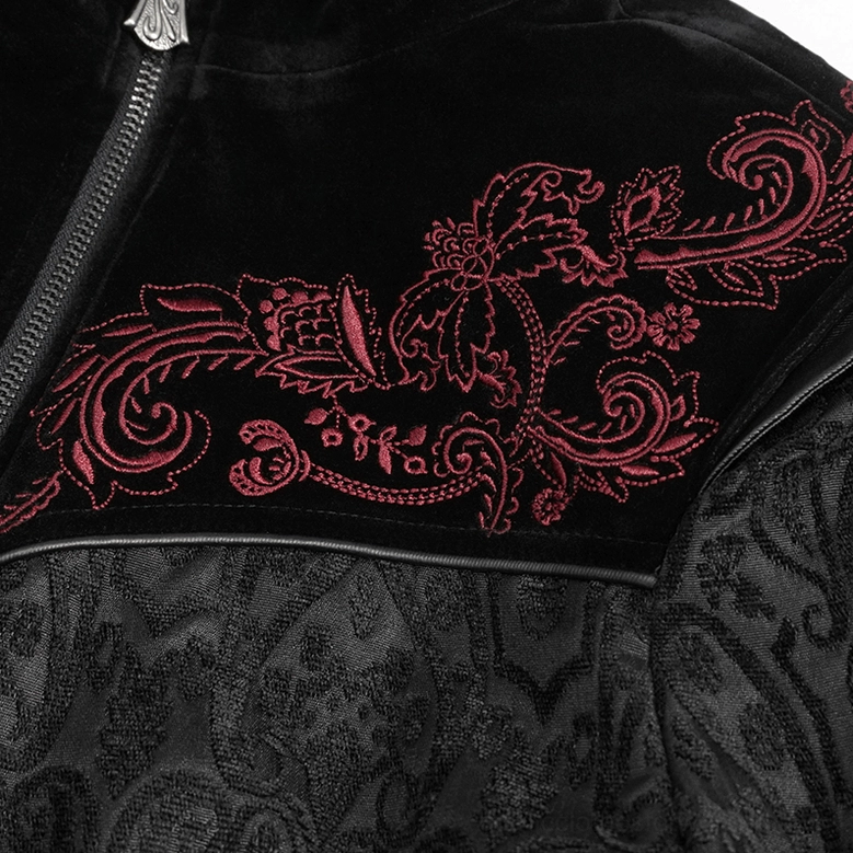 Black gothic coat shoulder embroidery close-up, showcasing red velvet floral embroidery on damask jacquard