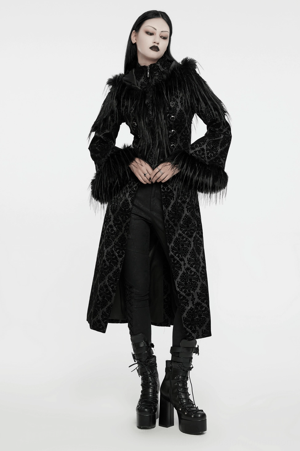 Gothic hooded coat side profile showing fitted silhouette and faux fur-trimmed hem