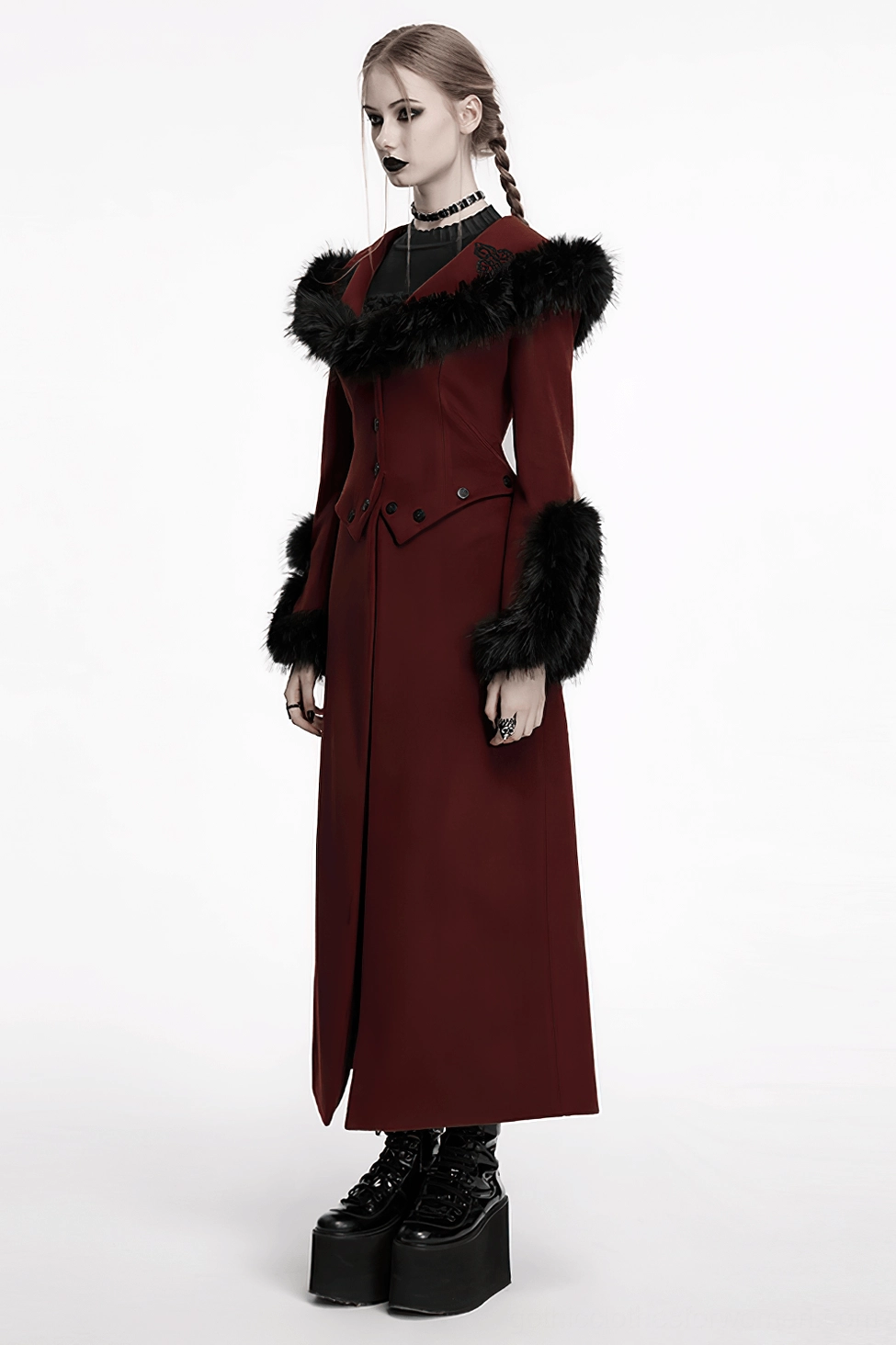 Side styling view of gothic two-piece coat demonstrating proportions, fitted waist adjustment, and flowing hem details