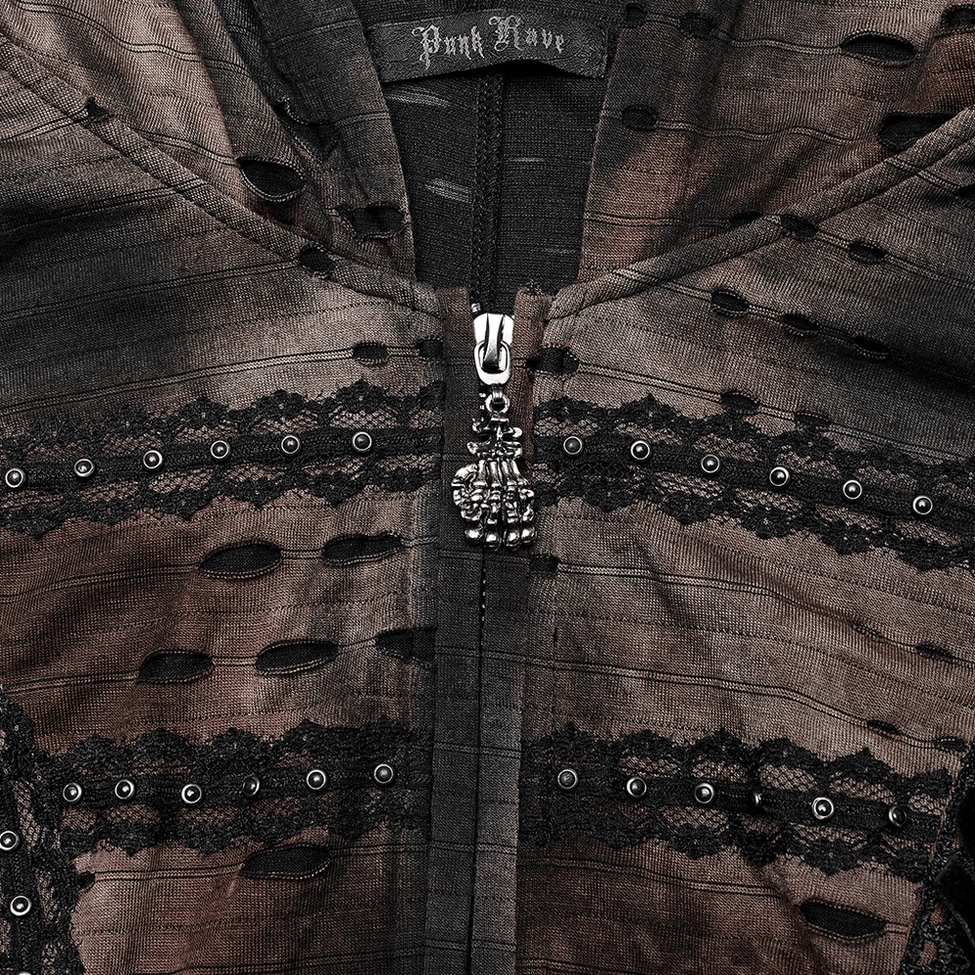 Close-up of coat neck closure detail featuring skull-shaped zipper pull and branded inner tag of distressed gothic coat