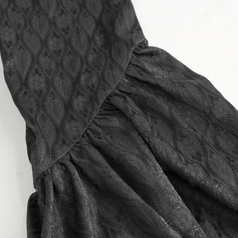 Close-up detail of flared sleeve with wavy jacquard texture on gothic coat