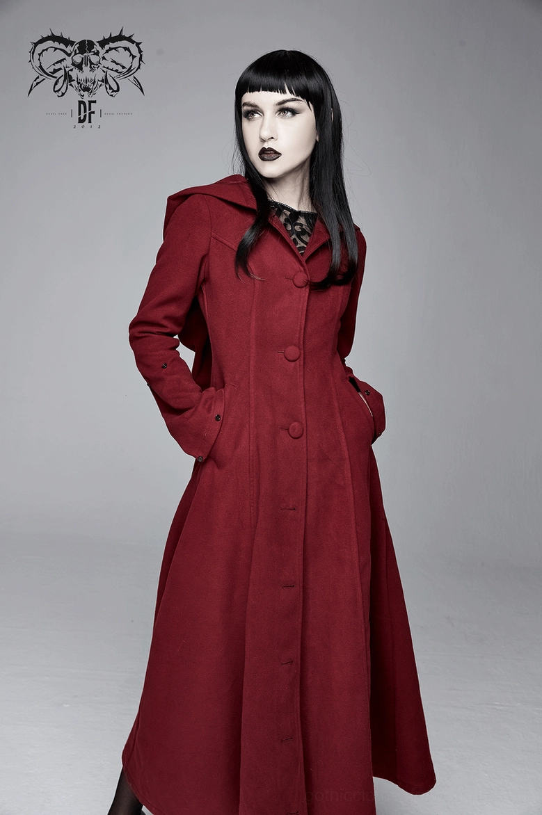Three-quarter view of burgundy gothic long coat displaying hem width and overall silhouette