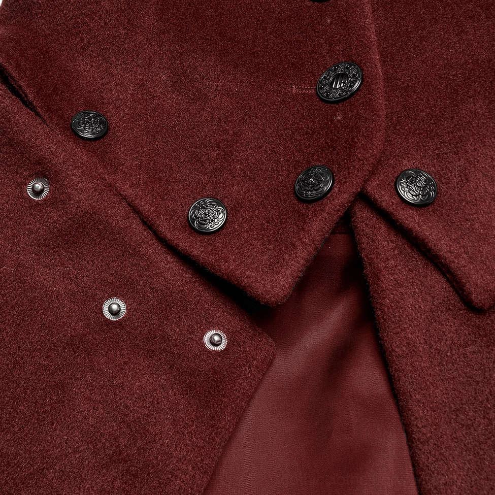Detail shot showcasing U-shaped cuff with handmade buckle accent, black faux fur, and decorative embellishment on wine red wool coat
