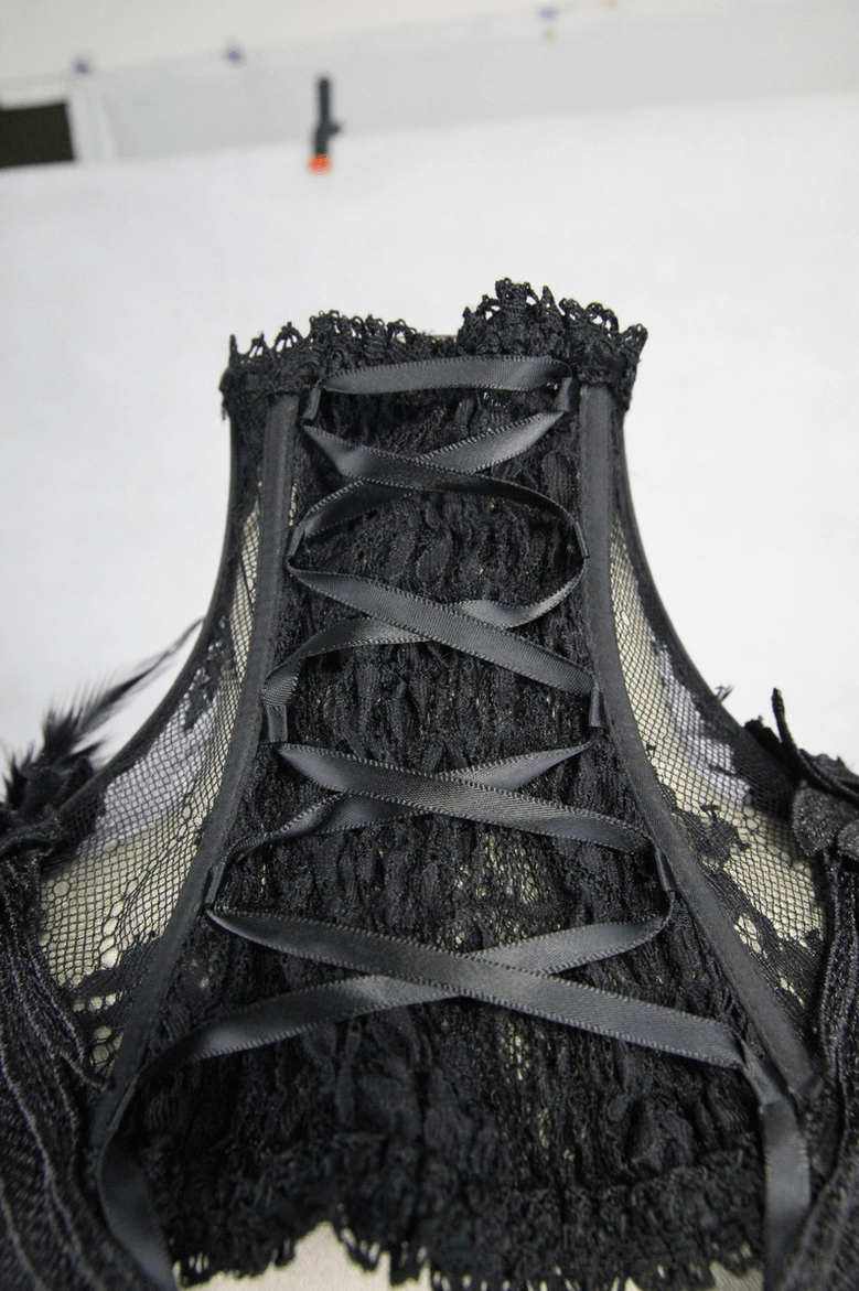 Black gothic lace high collar architectural details showing lace pattern, rose accents, and dimensional design