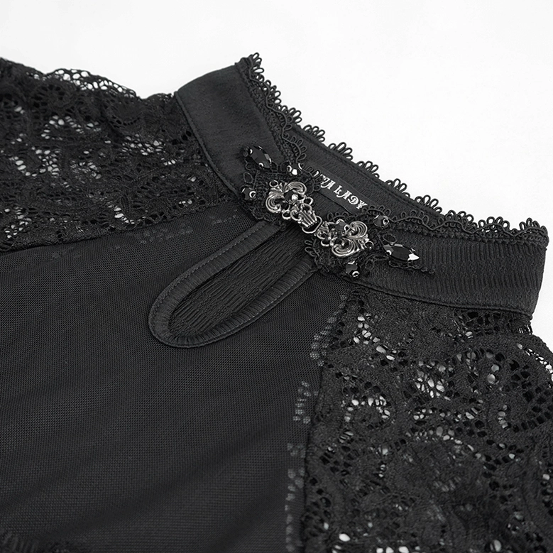 Close-up detail of black gothic metal collar clasp keyhole neckline and lace trim