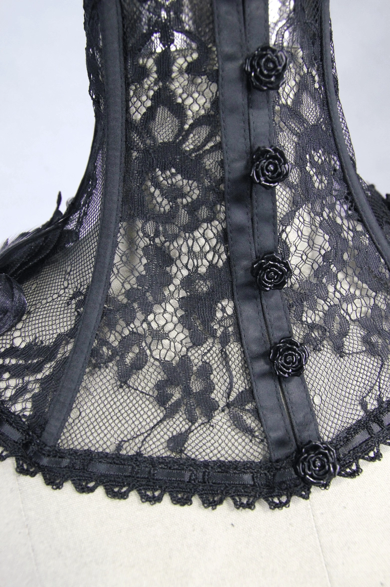 Close-up detail of gothic lace collar showing fabric rose buttons and intricate floral lace pattern