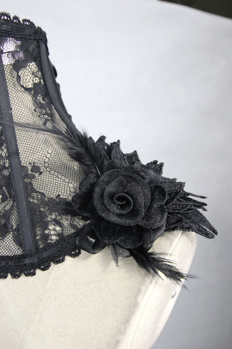 Side detail shot of gothic lace neck collar showing sheer lace, fabric roses, and feather wing appliqués