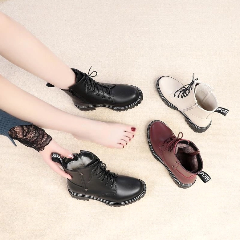 Gothic combat ankle boot frontal overview showing complete silhouette and design elements
