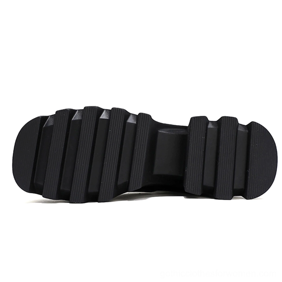 Gothic platform combat boot rubber outsole with ridged anti-slip tread pattern, bottom view
