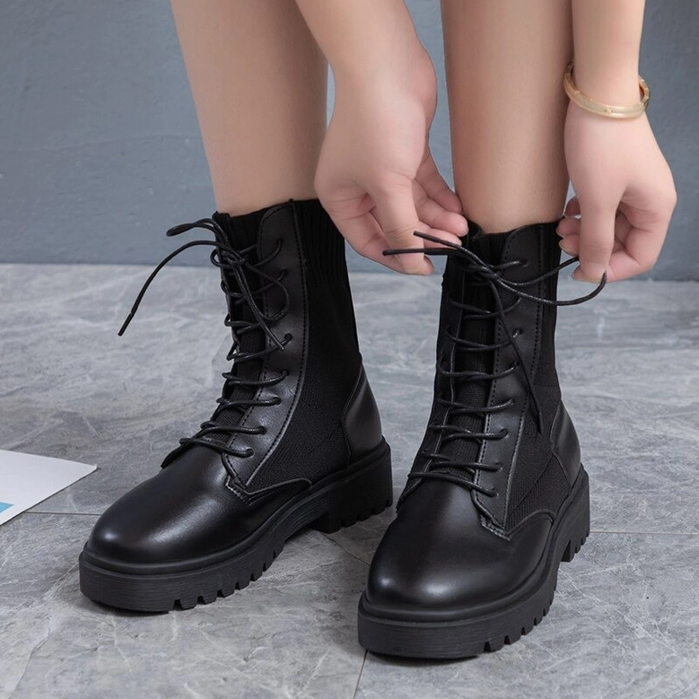 Black gothic platform combat ankle boots - women's lace-up boots with industrial aesthetic and tactical sole