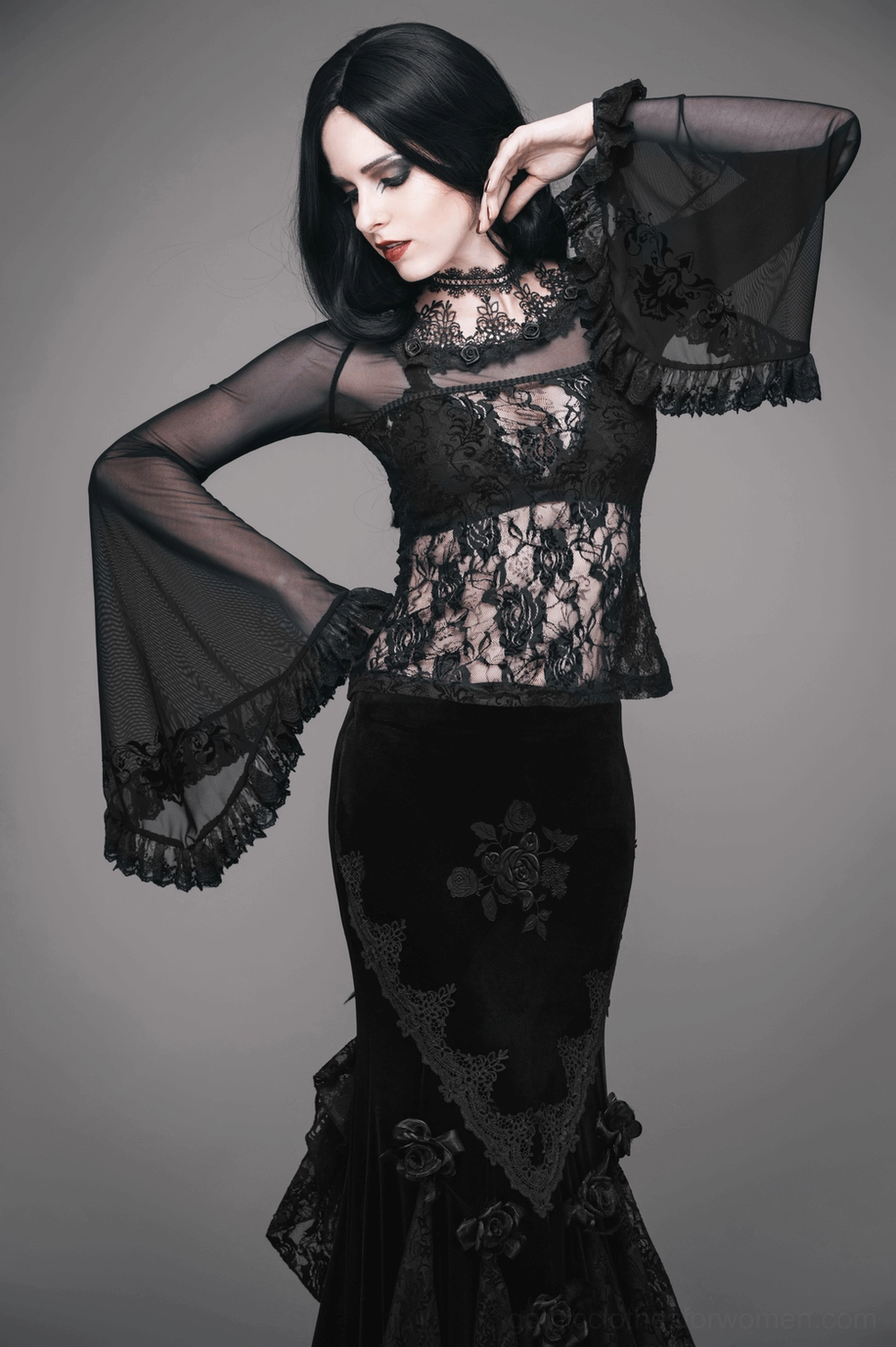 Black gothic lace corset back panel detail, ribbon lace-up and floral lace construction in sheer polyamide