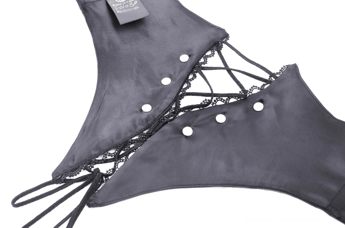 Top-down close-up of black lace-up corset belt back showing metal studs and lacing tie details