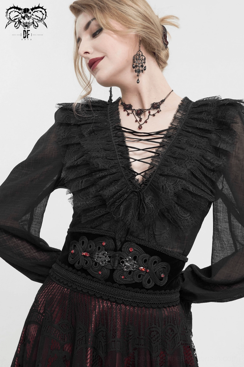Beading and buckle placement on gothic corset belt, showcasing red gemstone embellishments