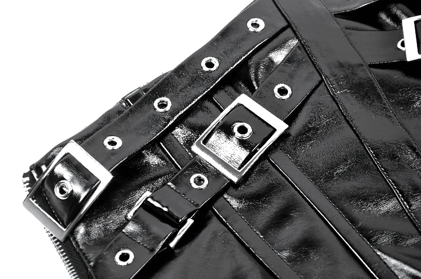 Macro close-up photography of silver buckles, metal rivets, and smooth glossy black leather surface