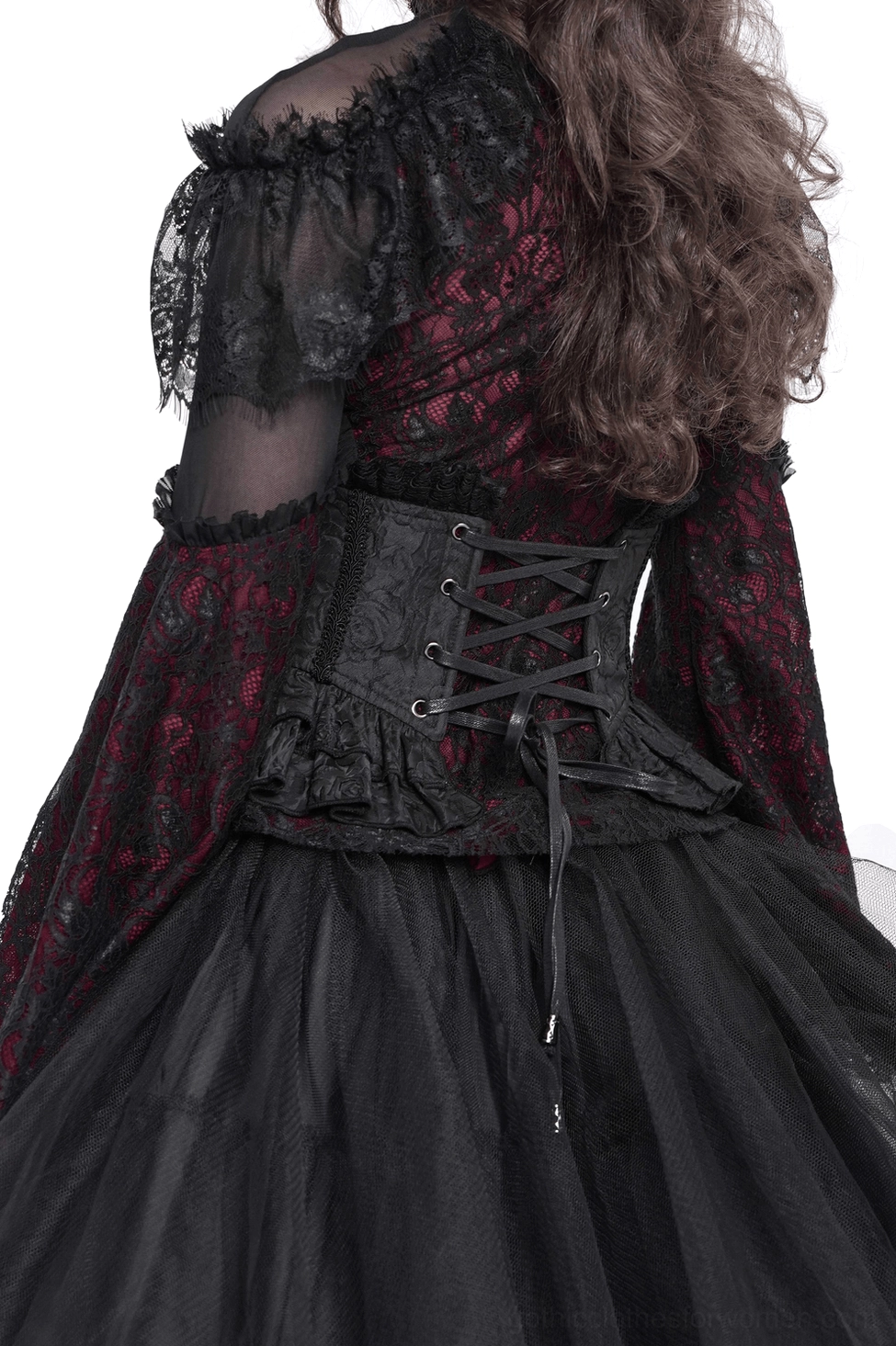 Black gothic corset belt with crisscross lace-up back design and metal eyelets, back view on model
