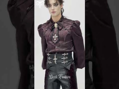 Back view flat lay of black gothic corset belt showing crisscross lace-up tie and decorative lace trim