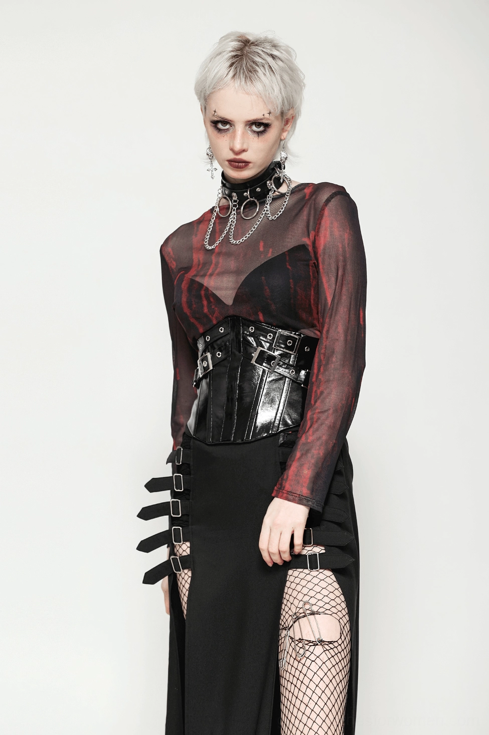 Product image of black leather corset belt with lace-up back and silver buckle accents on dark background