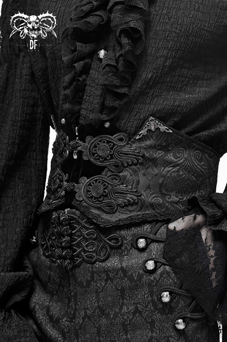 Close-up of worn black gothic corset belt showing layered ornate buckles and brocade fabric detail