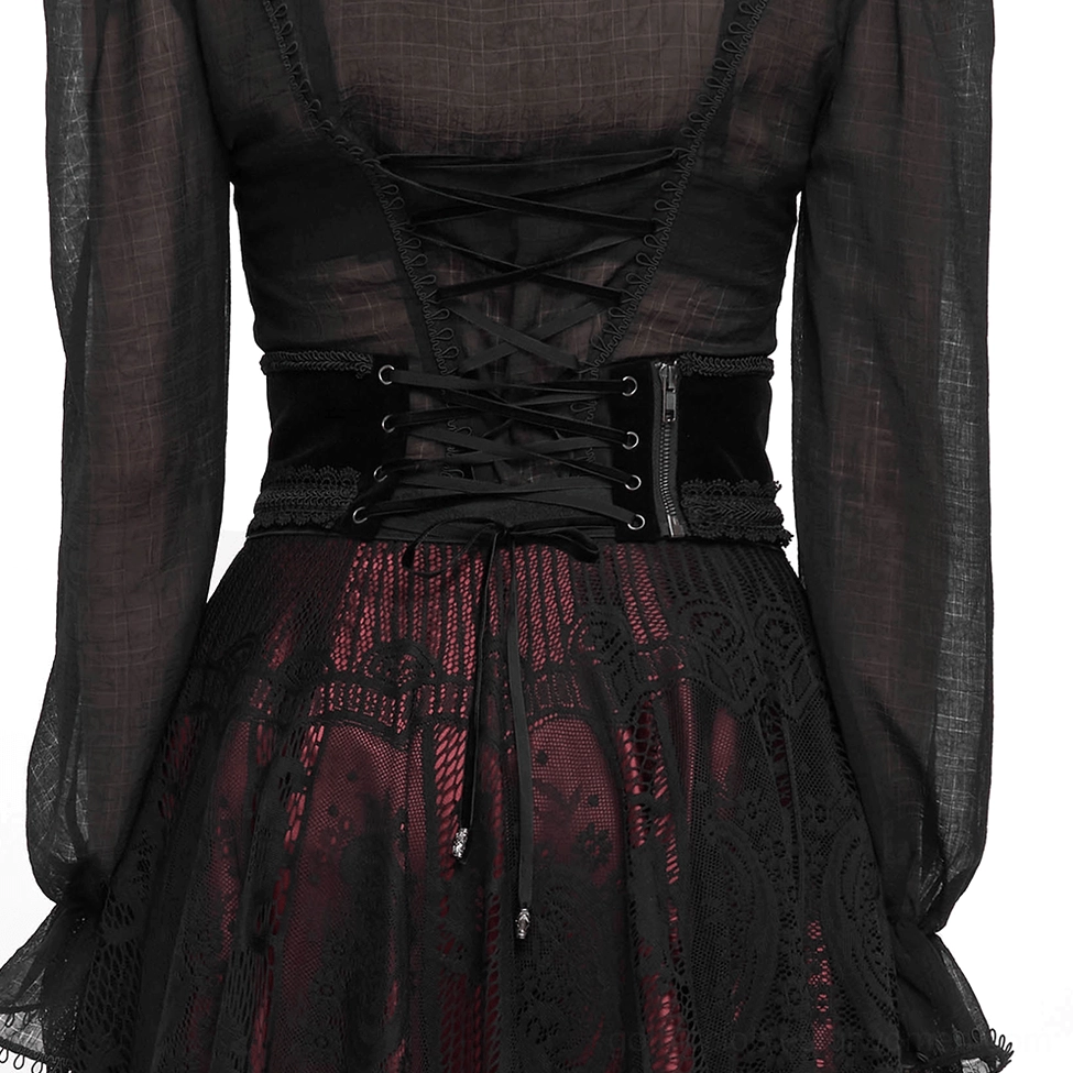 Gothic corset belt paired with black dress, back view showing lace-up construction and styling