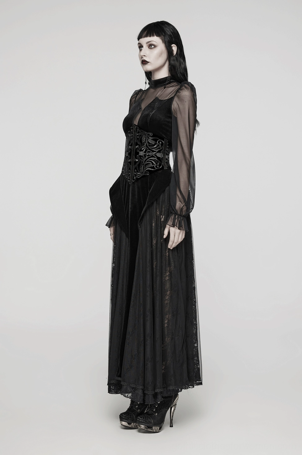 Black velvet gothic corset belt flat lay showcasing embroidered baroque patterns and premium construction