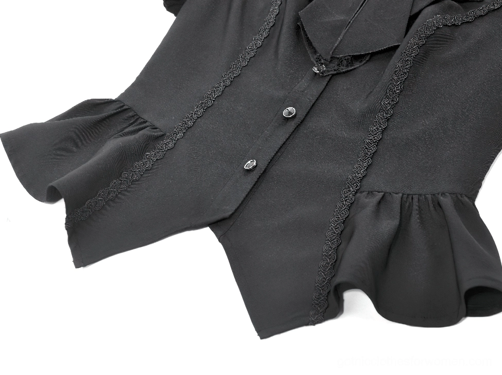 Gothic corset blouse button front and ruffled hem detail close-up view