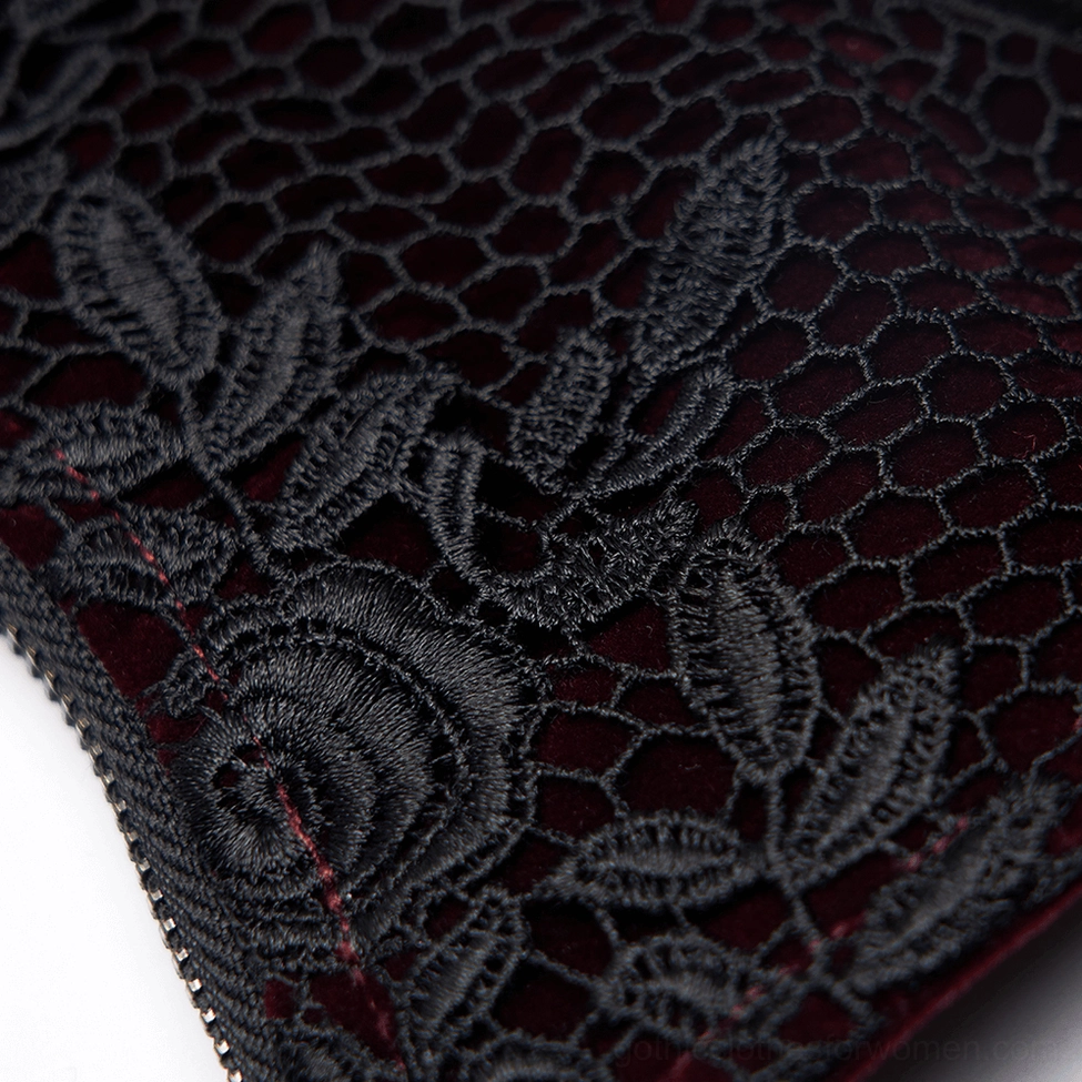 Branded metal tag and floral mesh lace fabric detail of wine red gothic corset belt