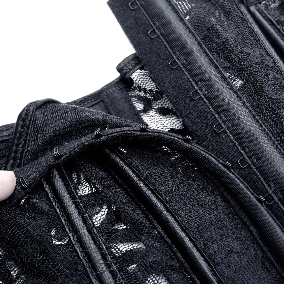 Macro close-up of gothic corset construction showing boning strips, hook-and-eye fasteners and satin trim
