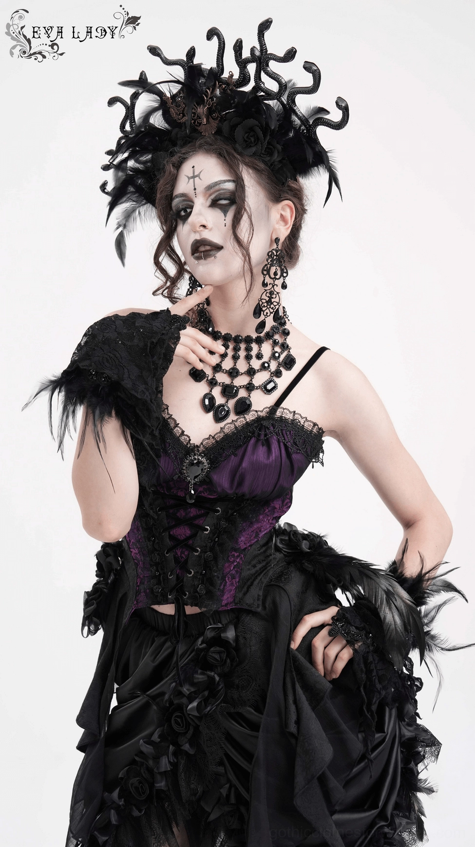 Purple and black gothic corset top showing close construction detail and premium fabric quality