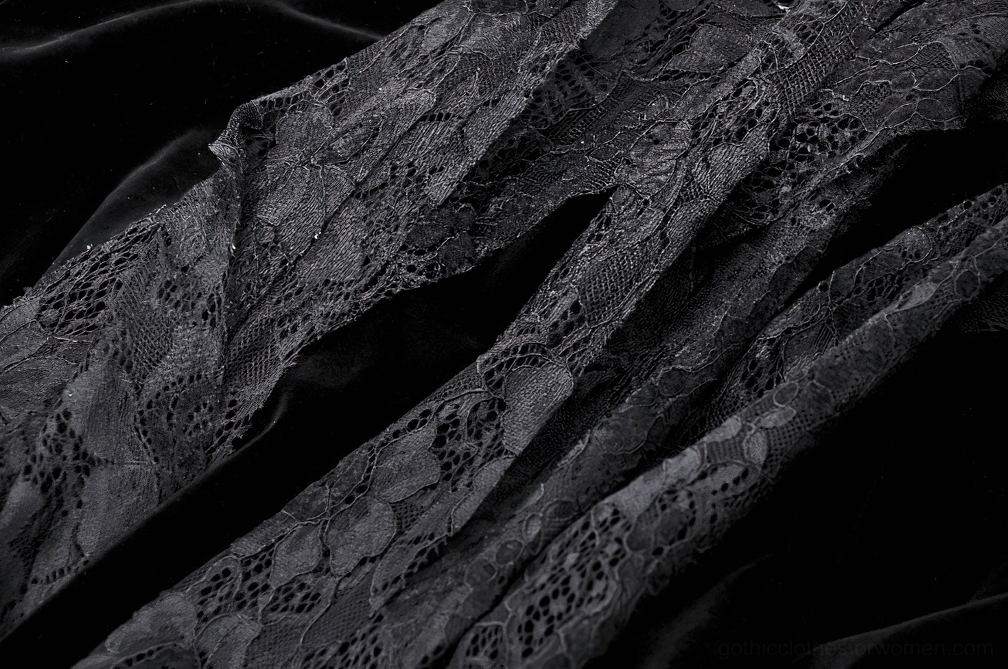Gothic corset dress construction detail showing quality lace workmanship and velvet integration