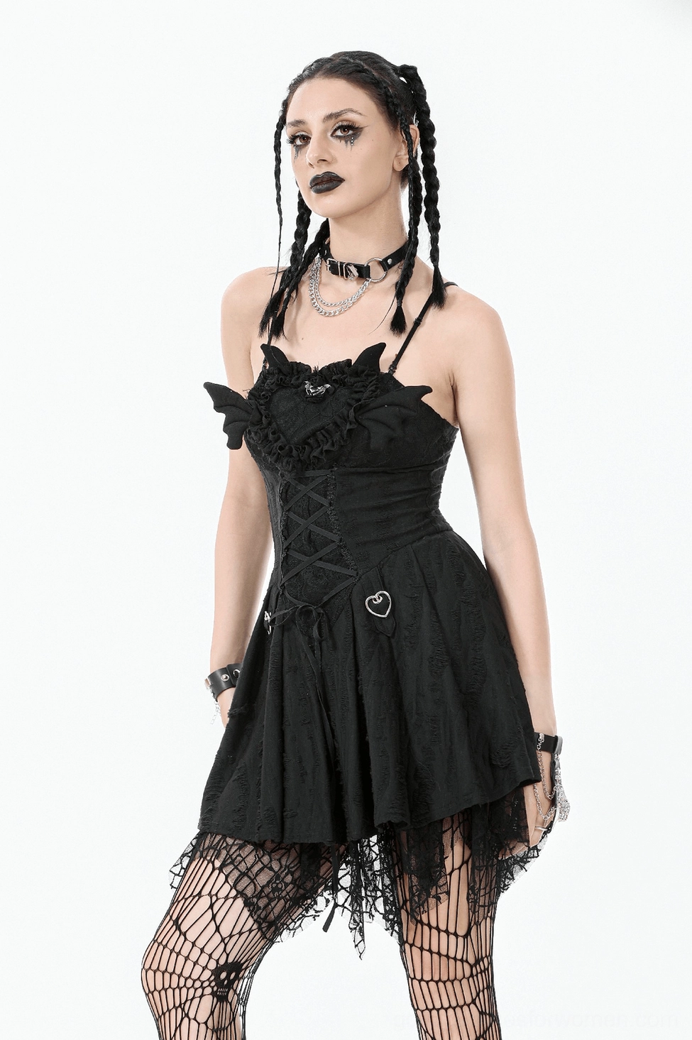 Black gothic corset mini dress side profile view showing silhouette and drape of pleated skirt