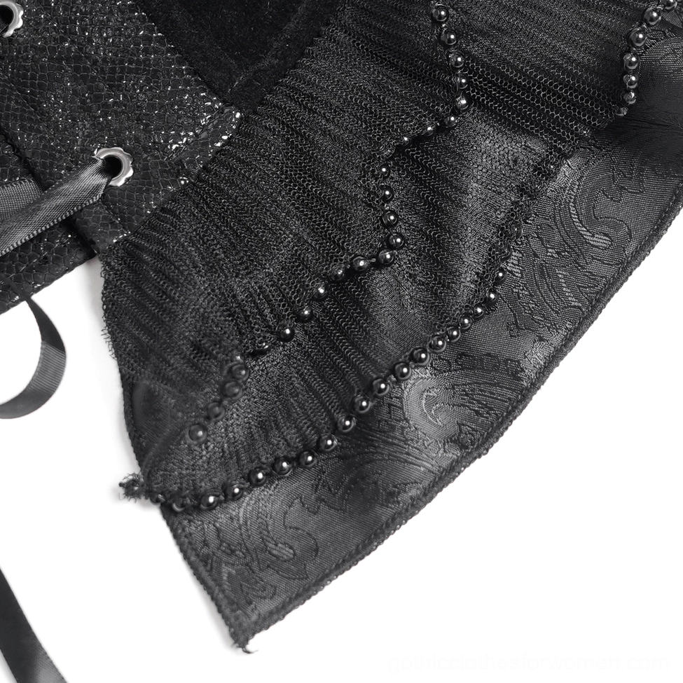 Black gothic corset showing complete construction with ruffle hem, satin straps and lace details