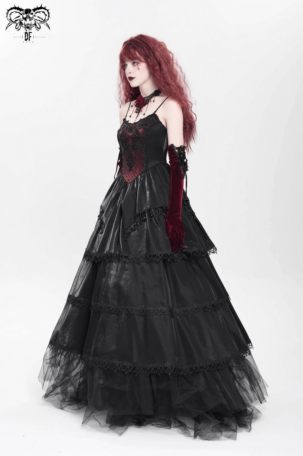 Gothic corset gown tiered layered construction dramatic silhouette alternative fashion