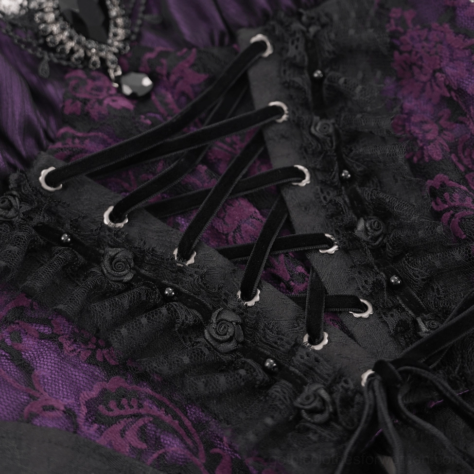 Close-up of gothic corset lace-up panel showing velvet straps and purple floral lace with rose accents