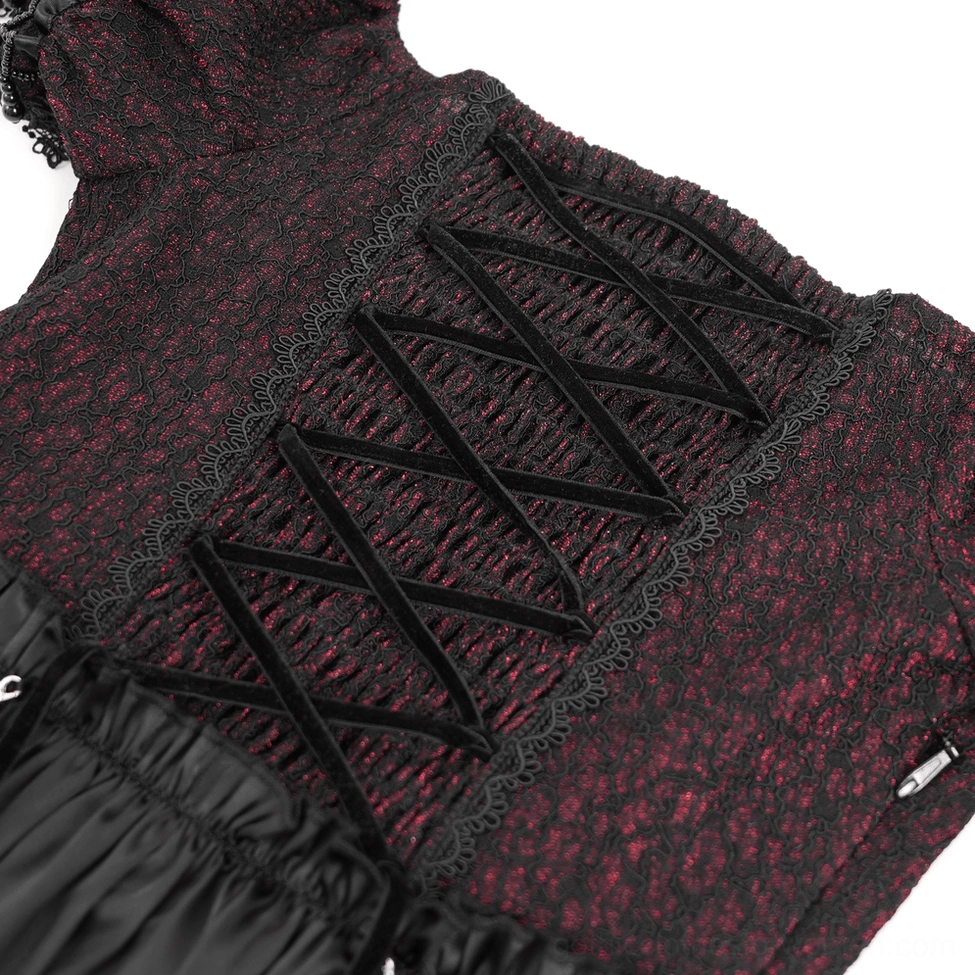 Close-up corset detail of gothic gown showcasing velvet lace-up straps, ruched fabric construction, and burgundy patterned base layer elegance