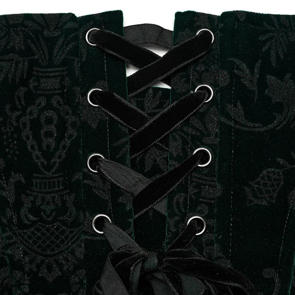 Close-up of corset front lace-up detail showing velvet ribbon lacing, metal eyelets, embossed floral velvet pattern, and intricate lacework craftsmanship
