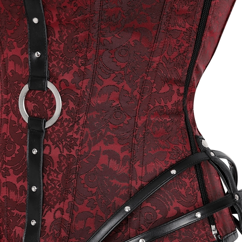 Close-up detail of burgundy jacquard texture, leather strap with metal rivets and O-ring hardware