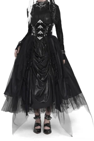Black corset waist mesh maxi skirt front three-quarter view on model showing asymmetrical tulle hem and ruched drape detail