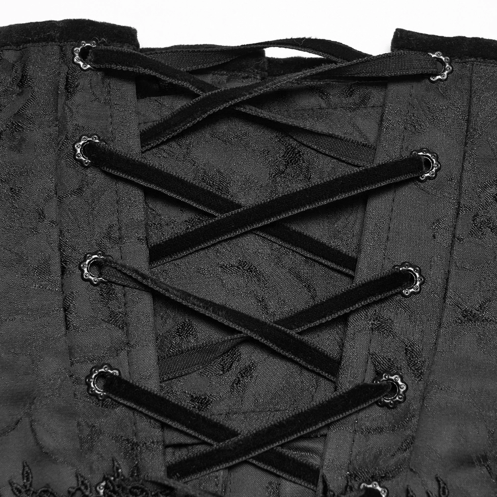Metal lace eyelets on velvet ribbon lace-up closure detail of black jacquard gothic corset