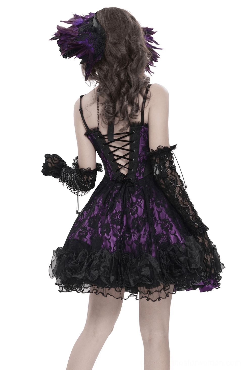 Back view of purple gothic corset dress showing lace-up back closure, ruffled hem, and long lace gloves on model