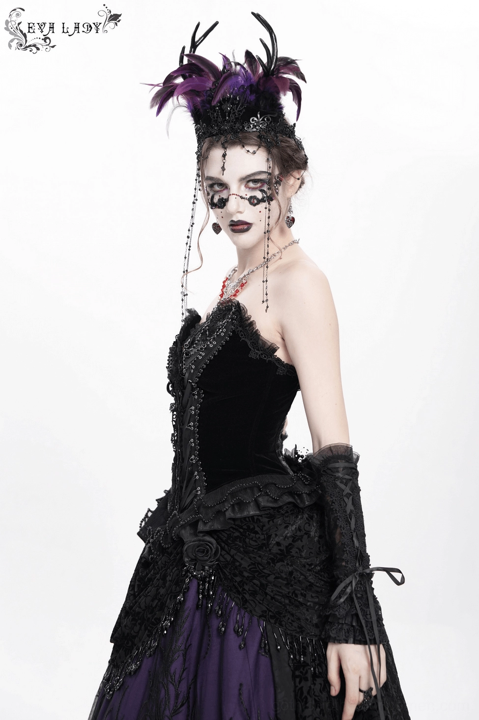Black lace-up gothic corset with satin straps displayed on model showing fit and style