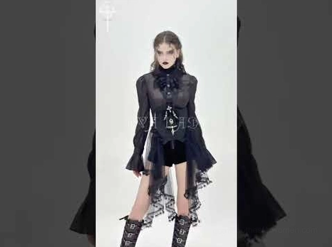 Gothic underbust corset styling with sheer black blouse layered over corset, demonstrating versatile gothic fashion combinations