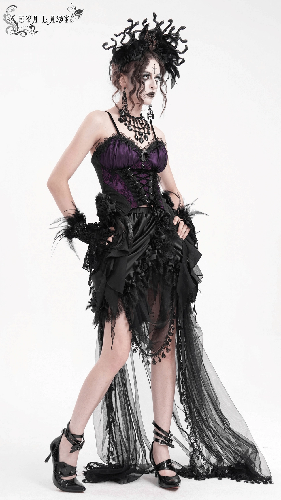Gothic corset top showing sheer side panels and ruffled accent details in purple and black