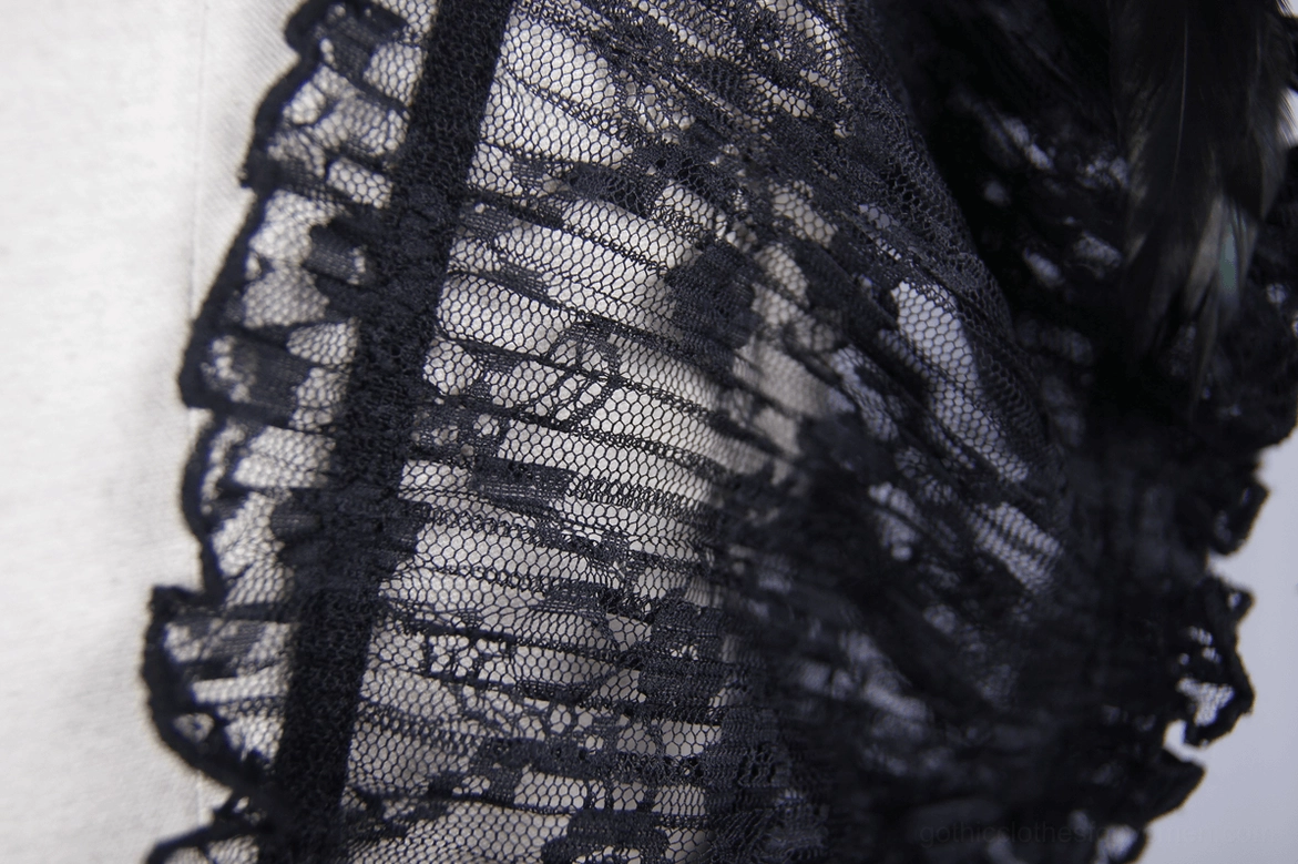 Side detail of black gothic sheer corset, ruffled lace edge and transparent floral lace panel