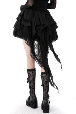 High-low gothic skirt with asymmetric tulle hem and lace-up corset detail, rear three-quarter view with platform boots