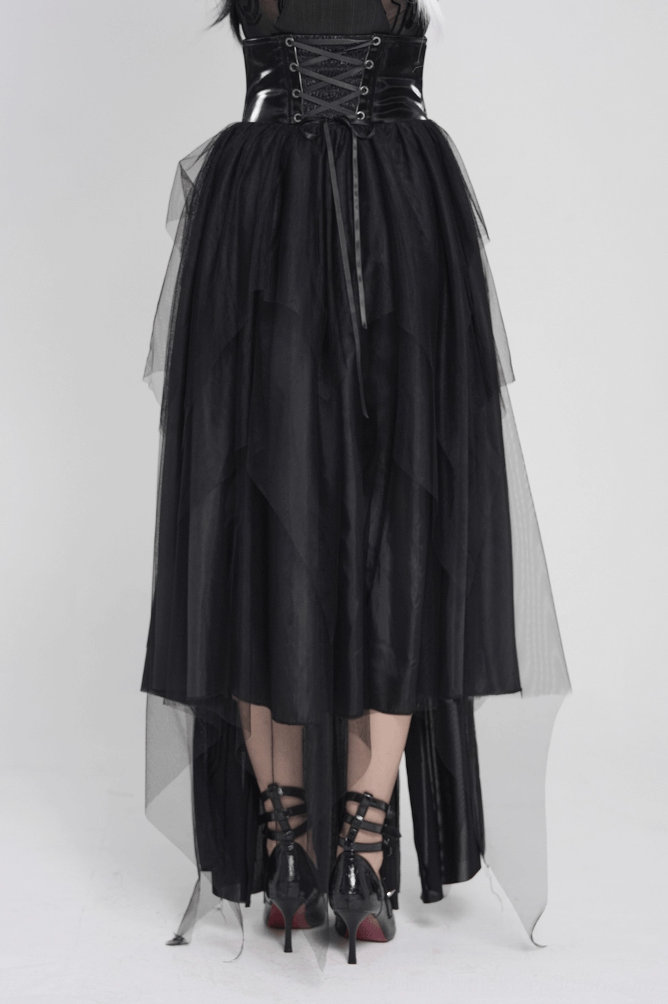 Black corset gothic maxi skirt side angle view showing lace-up back and overall silhouette